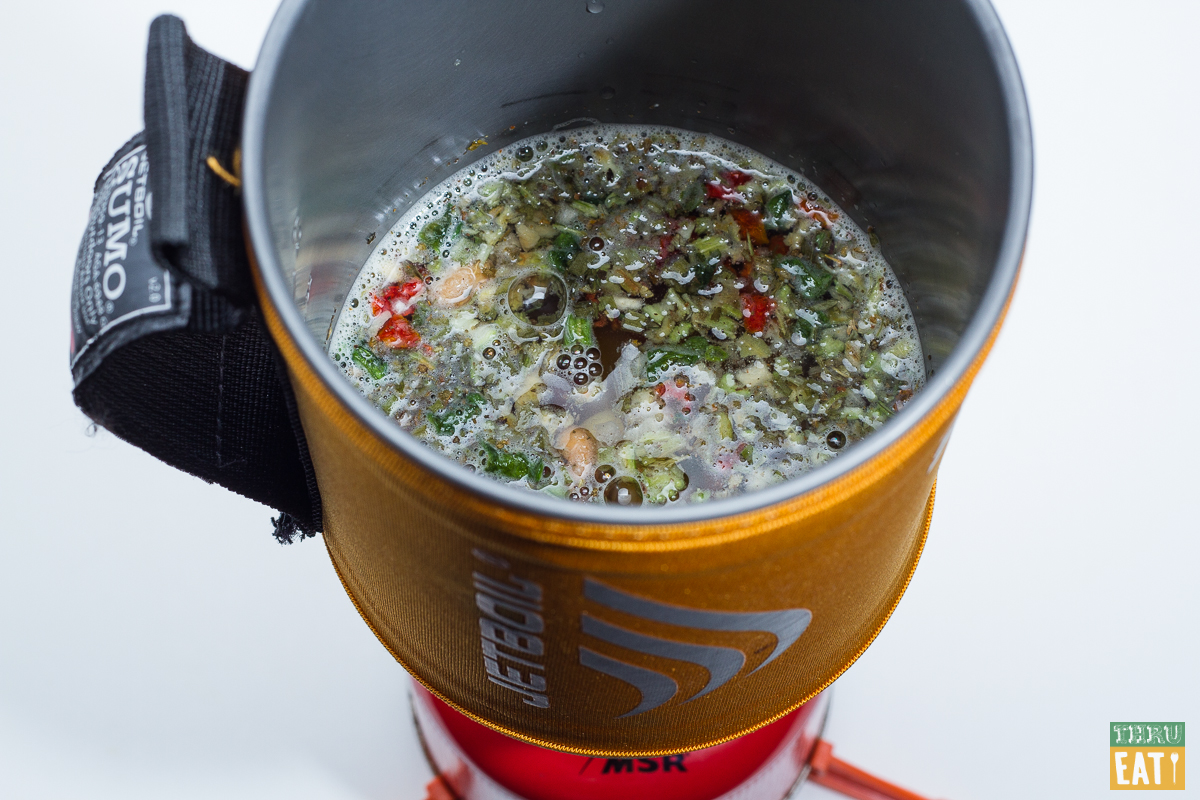 Backpacking minestrone soup cooking in a Jetboil