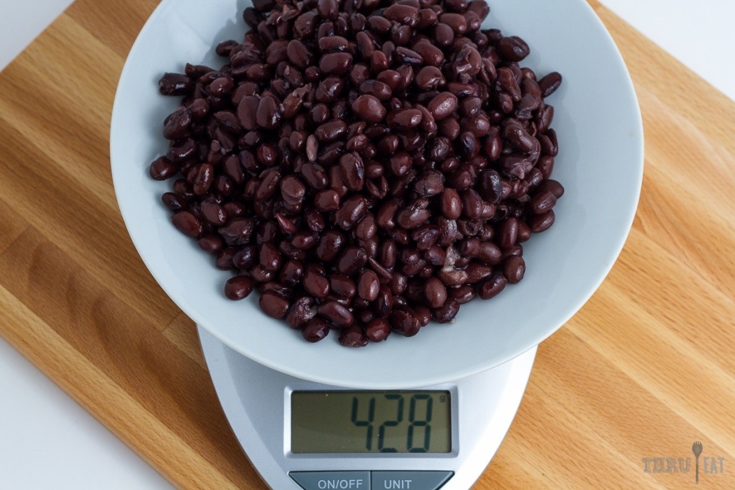 Easy backpacking protein boost 428 grams of canned black beans on a scale
