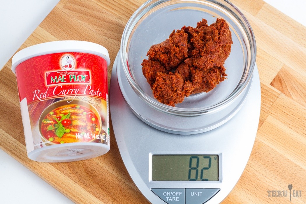 82 grams of red curry paste on a scale