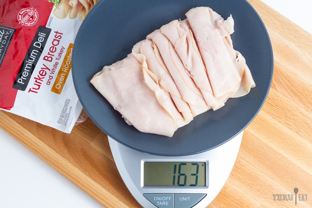 Deli turkey is pre-sliced and very convenient for dehydrating 163 grams of deli turkey on a scale