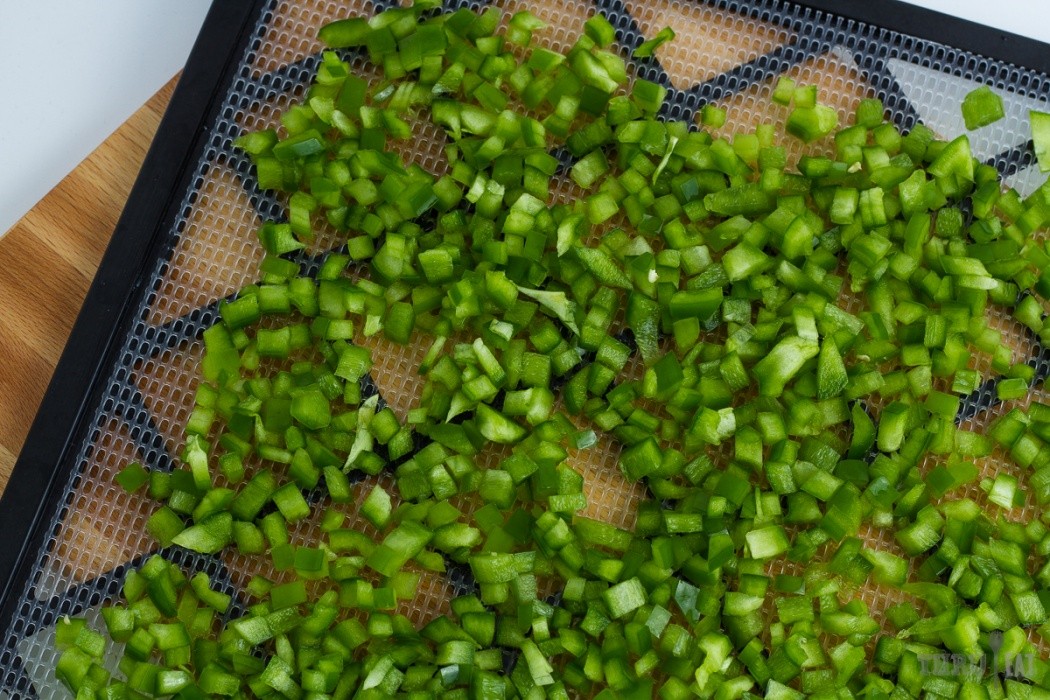 Crank up your nutrient intake with bell peppers diced green bell pepper on a dehydrator tray