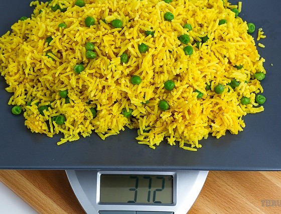 golden basmati rice on a scale